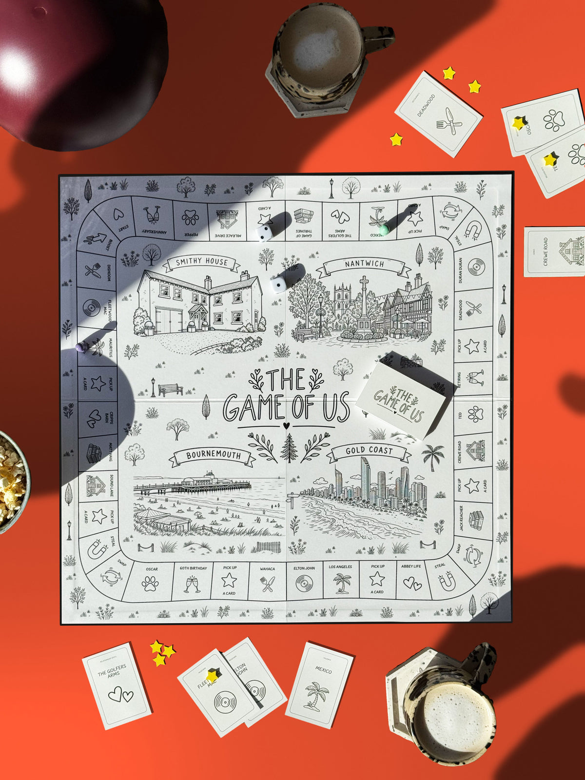 The Game Of Us personalised board game mid-play on a tomato red table